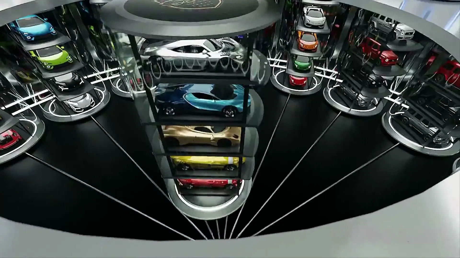 Looking down a shaft of stacked cars in our showroom film