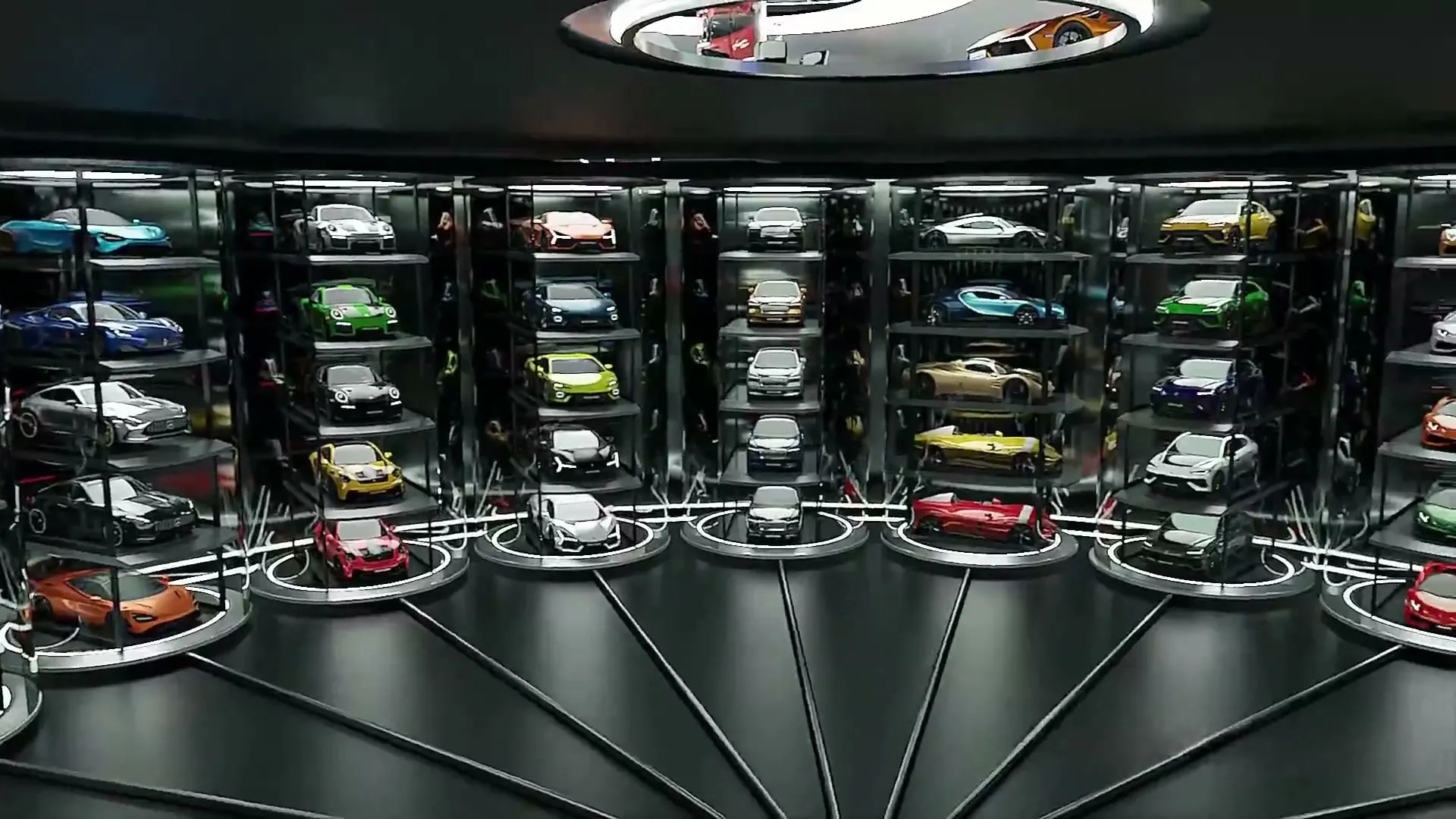 Rows of glass car towers, each lit from above
